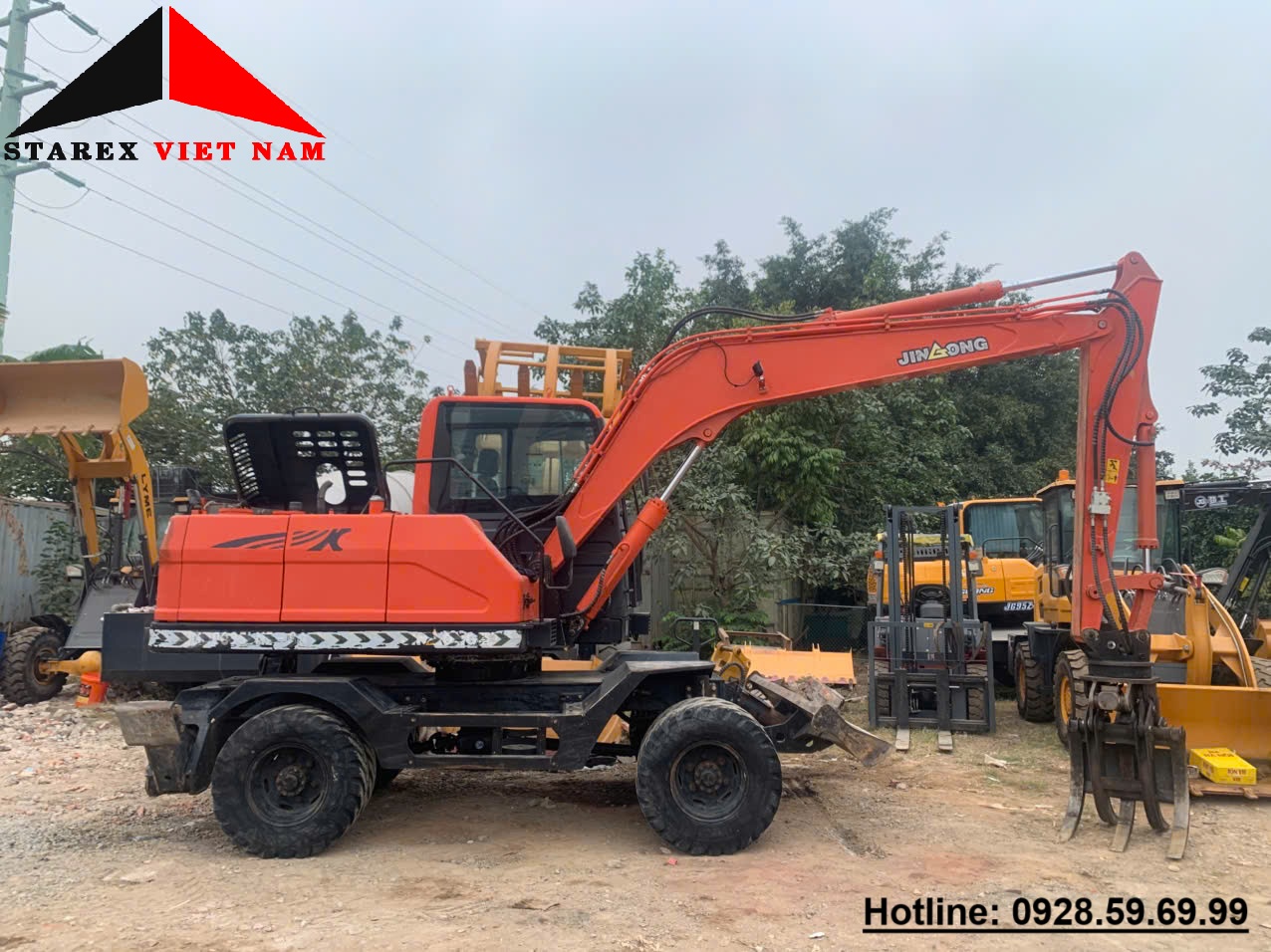 Máy xúc bánh lốp cũ