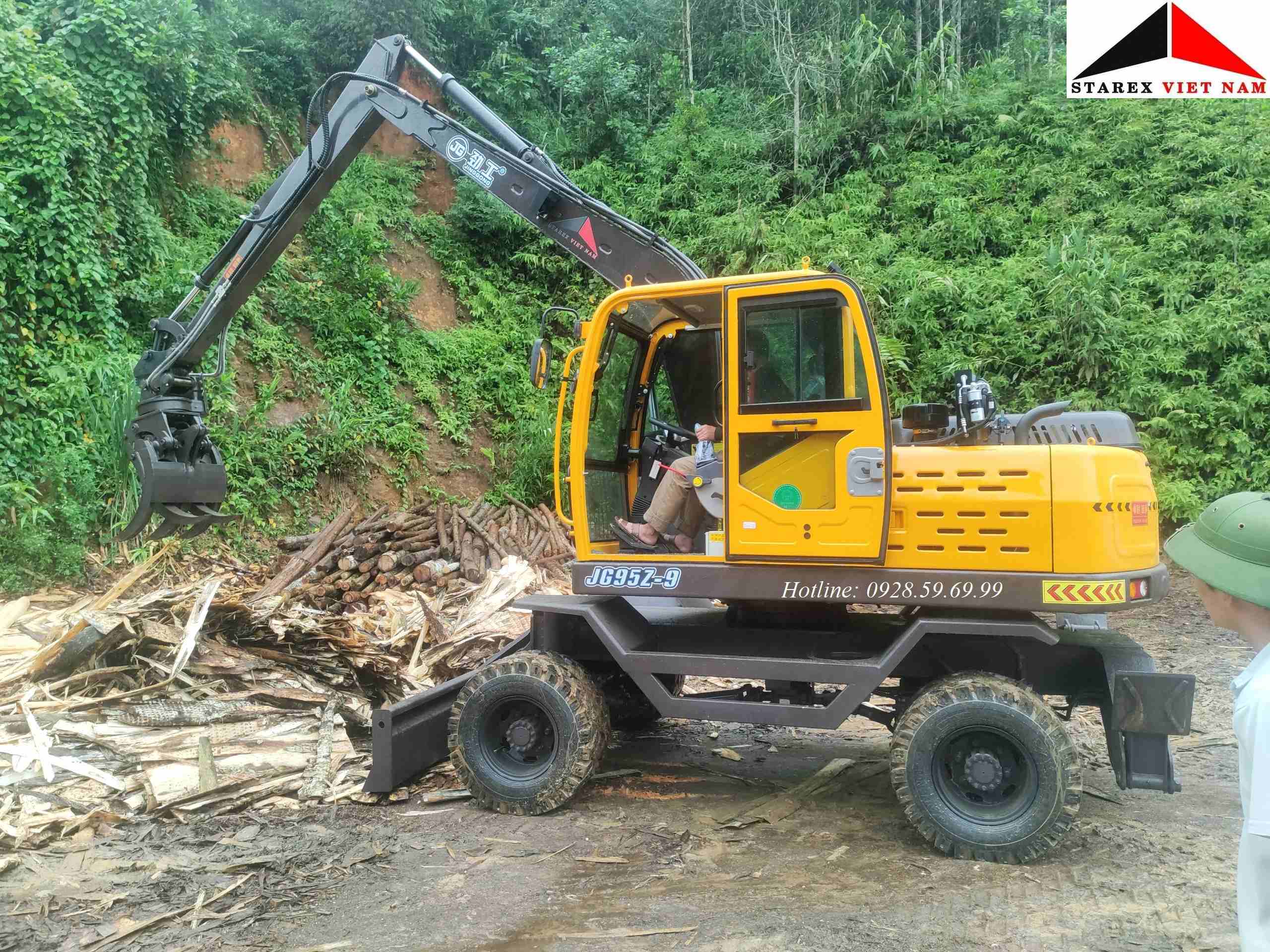 máy xúc đào bánh lốp gắp gỗ JINGGONG JG95Z-9