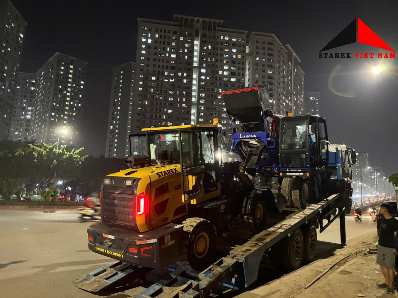 Xe trộn bê tông tự nạp liệu