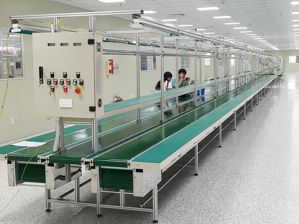 Nguyên lý hoạt động của băng tải dây đai là gì?