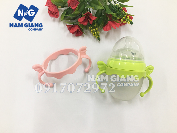 quai-cam-binh-sua-comotomo