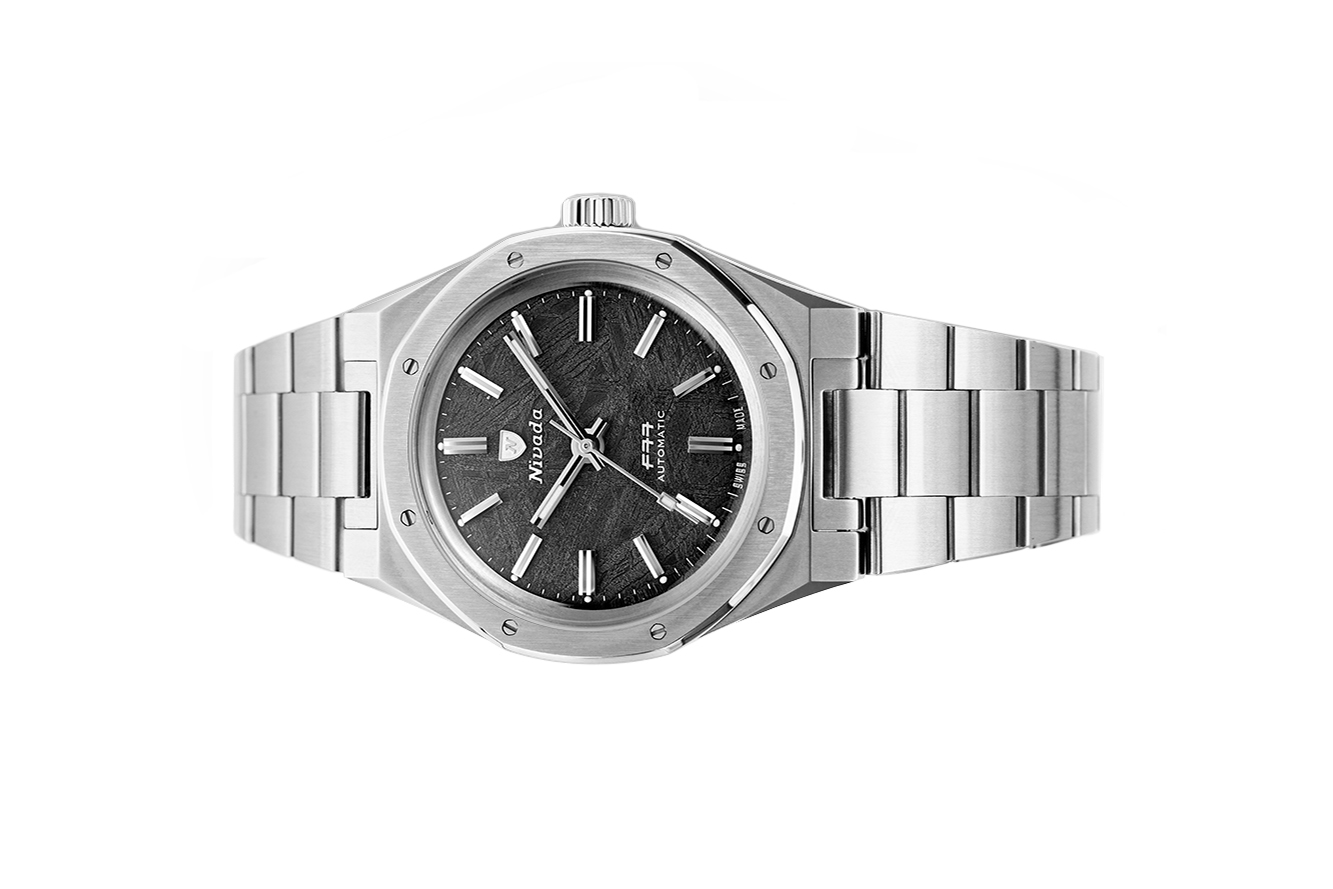 Nivada Grenchen, dòng sản phẩm F77, Ref number: 68016A77, mặt số thiên thạch màu xám size 37mm, máy tự động, dây và vỏ bằng thép không gỉ, mới 100%