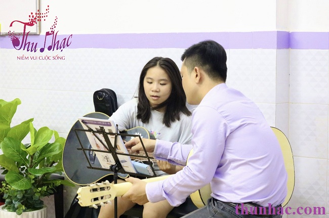 dạy chơi guitar