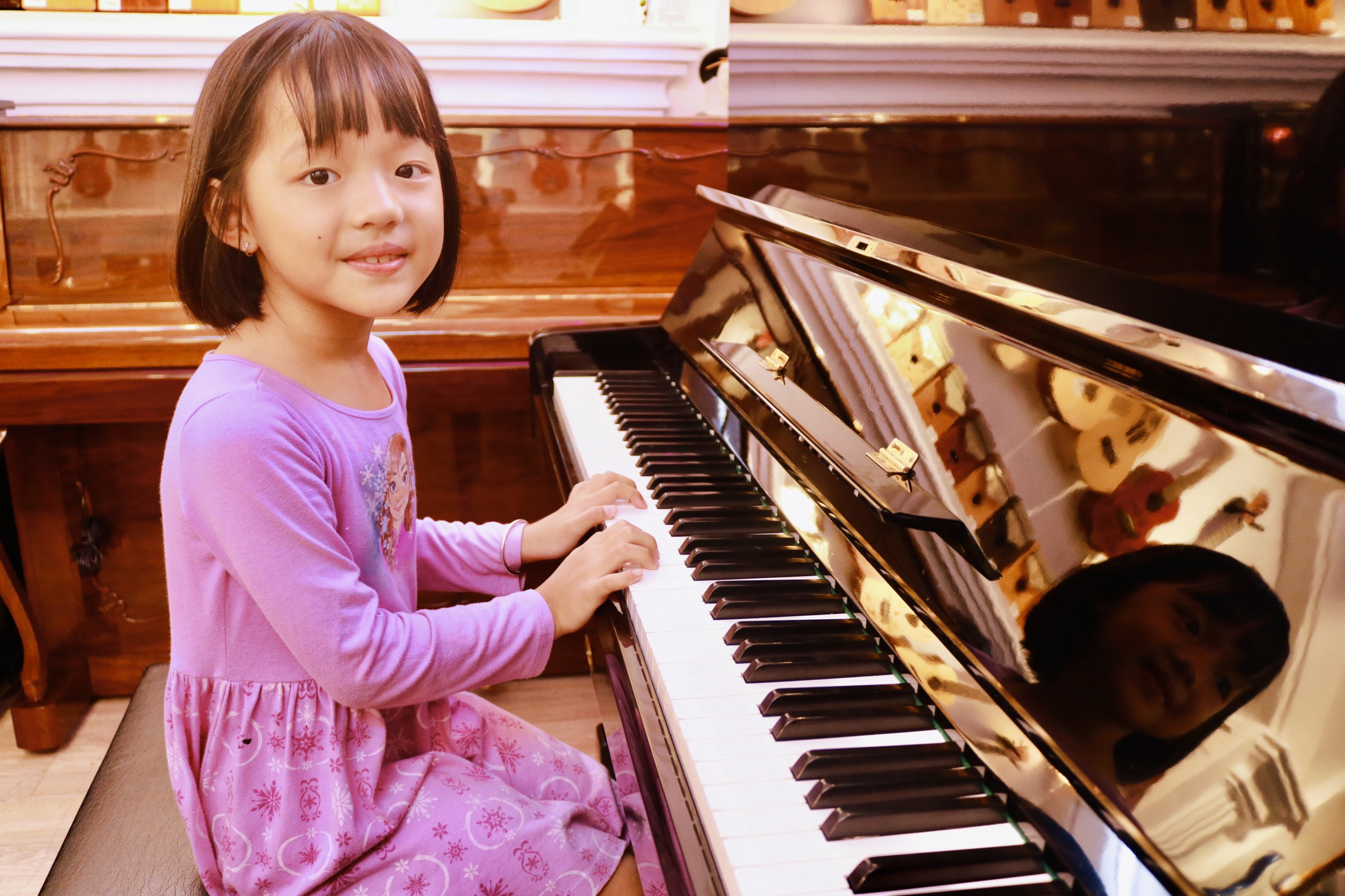 Lợi ích của việc học đàn piano cho bé