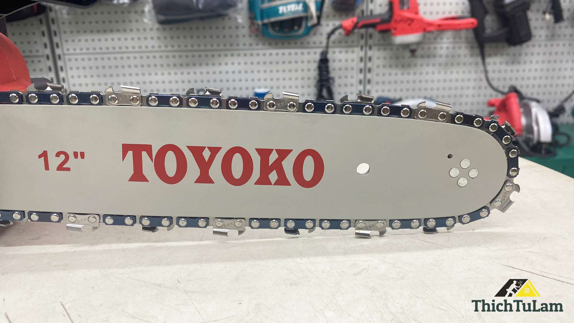 Bộ máy cưa xích pin M21V 254mm Toyoko T12301F (2 pin +1 sạc)