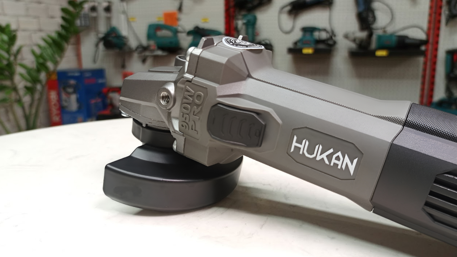 Máy mài công tắc trượt 100mm 950W Hukan HKG2-AG50950PRO