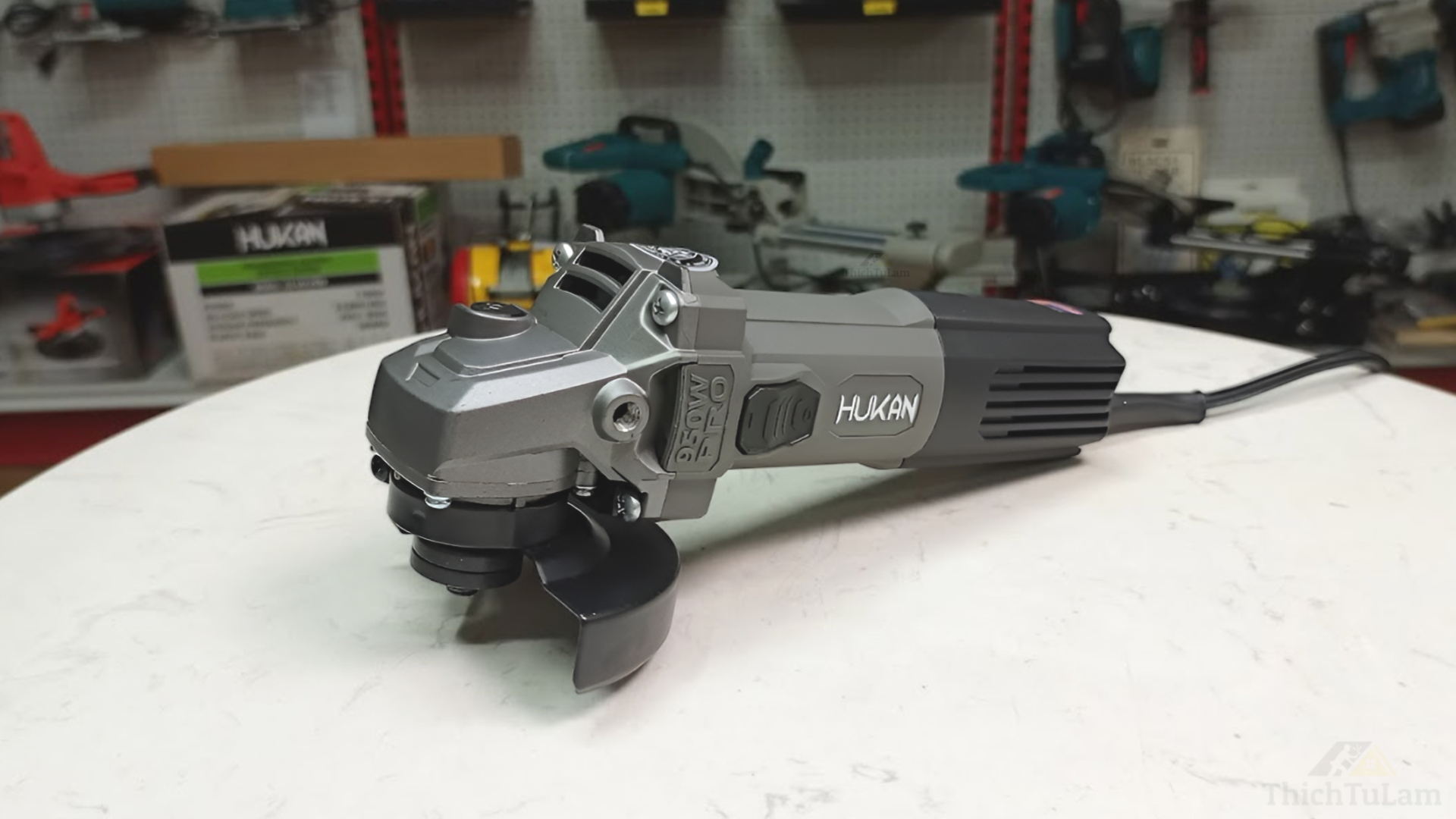 Máy mài công tắc trượt 100mm 950W Hukan HKG2-AG50950PRO