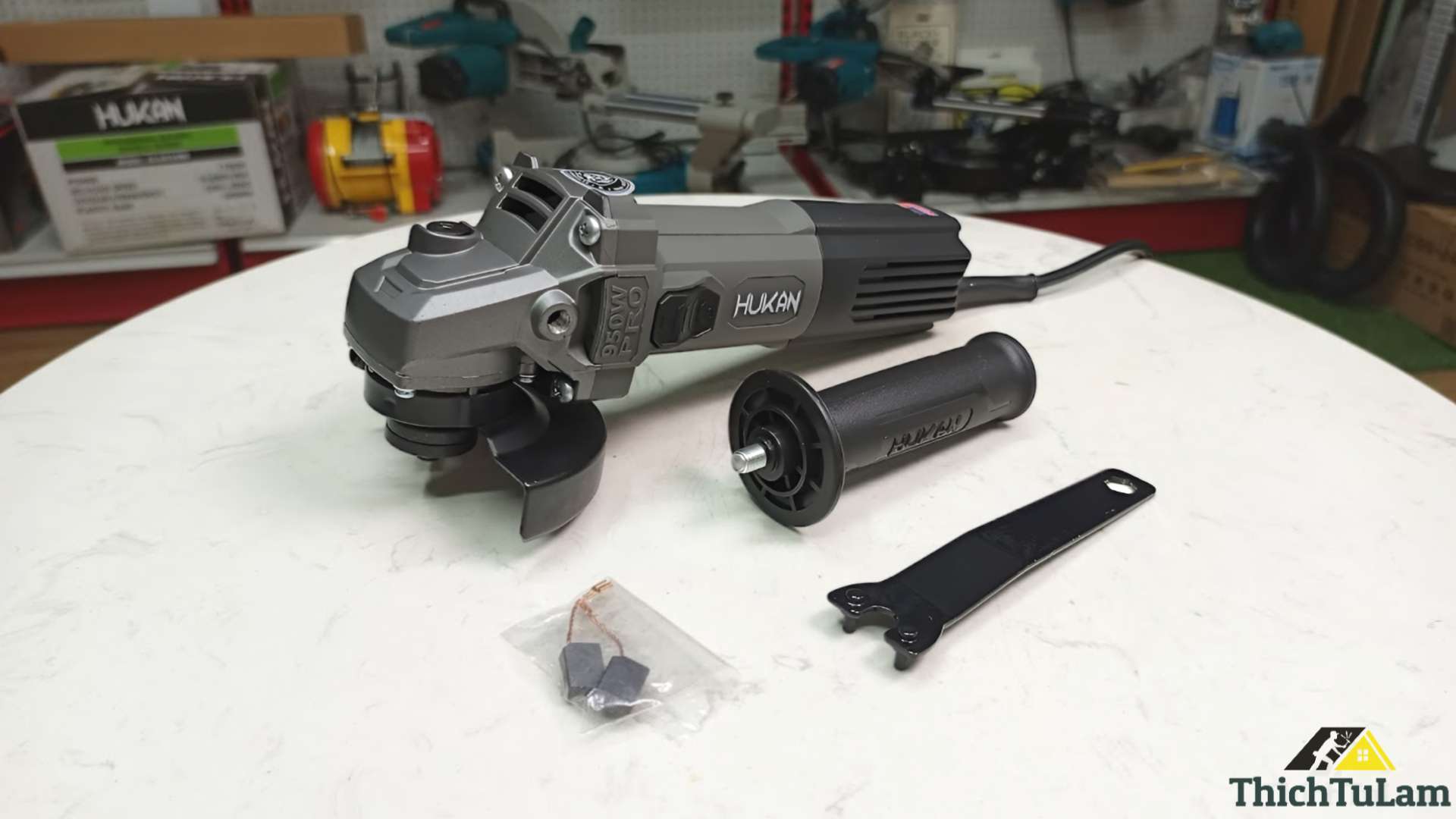 Máy mài góc công tắc trượt 100mm 950W Hukan HKG2-AG50950PRO