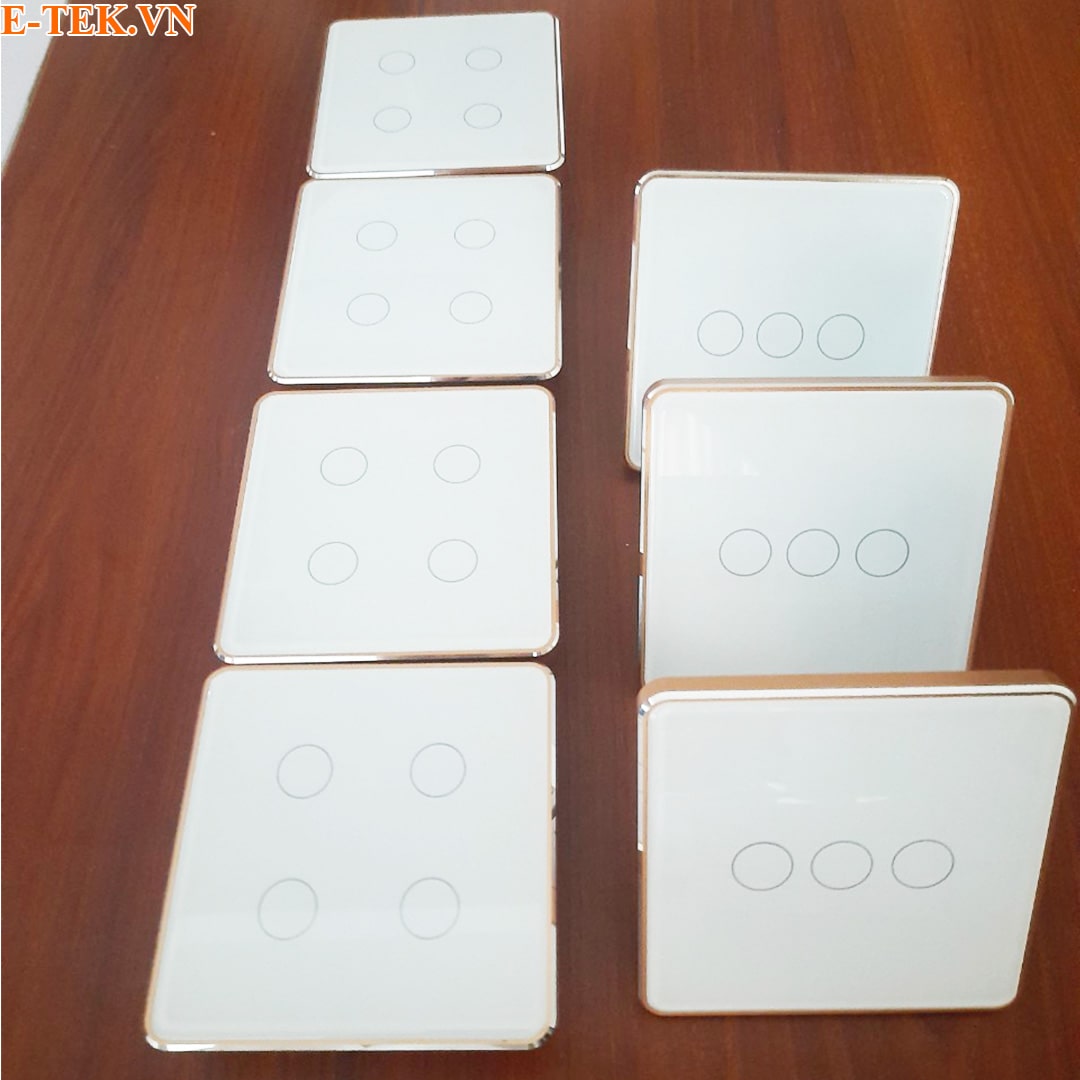 Công tắc viền vàng tuya màu trắng