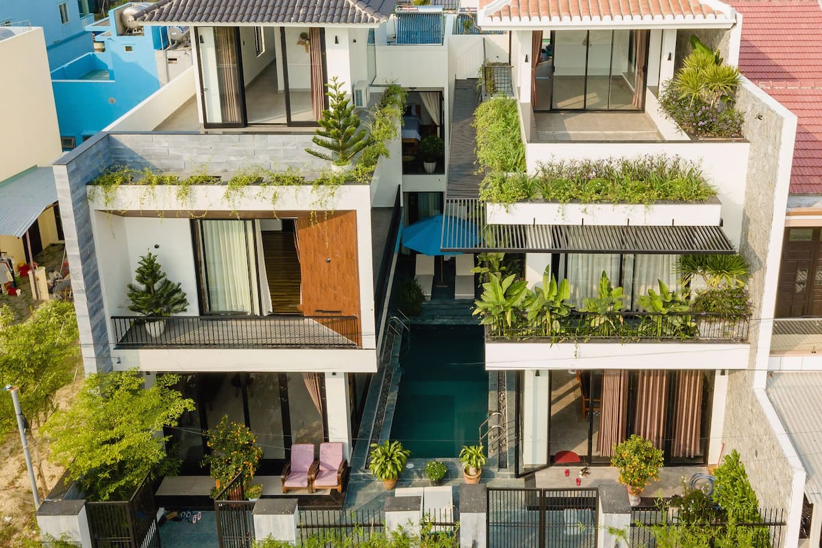 Biệt thự mini xanh thiết kế lạ mắt