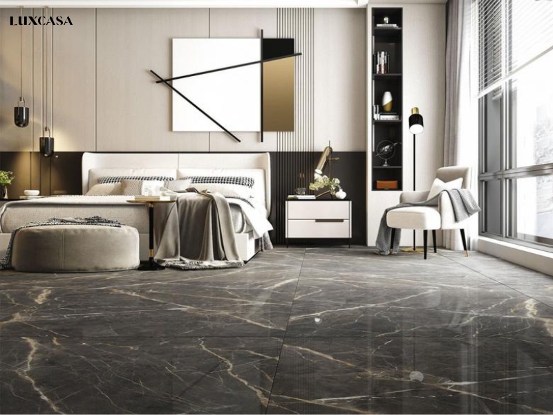 Gạch lát phòng ngủ giả đá màu đen vân marble được khách hàng lựa chọn khi dùng ở không gian lớn và đủ ánh sáng để tránh bị quá tối