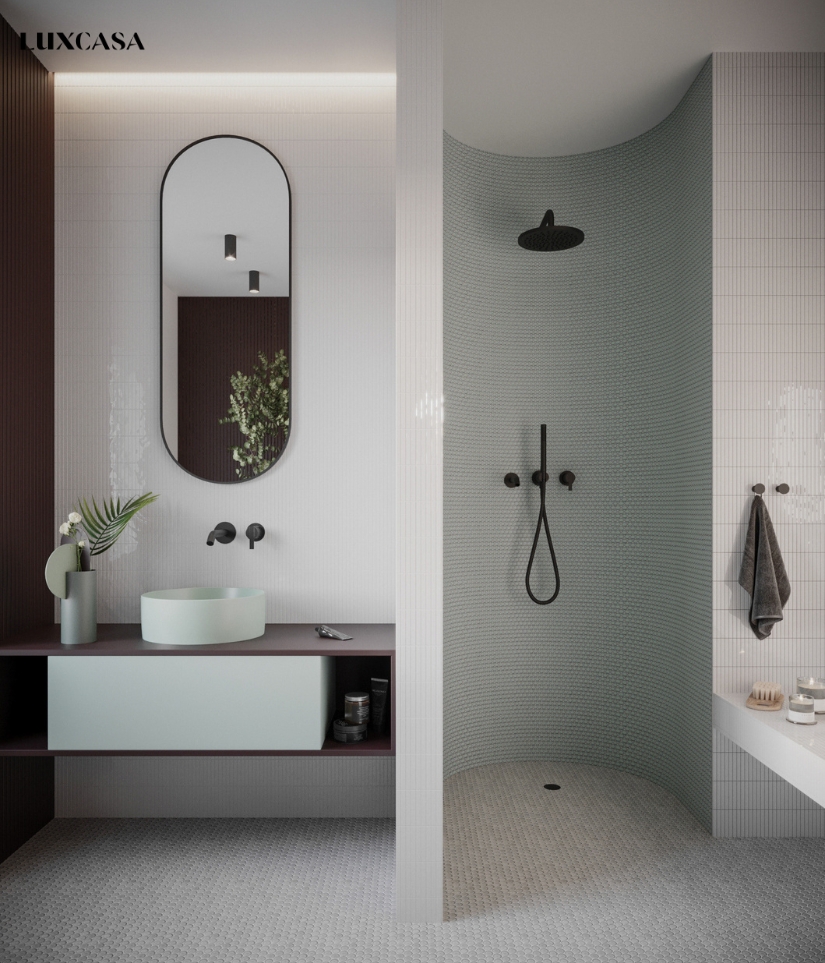 Thiết kế mẫu gạch mosaic màu trắng, thêm một ít màu xanh để tăng thêm tính thẩm mỹ cho nhà tắm
