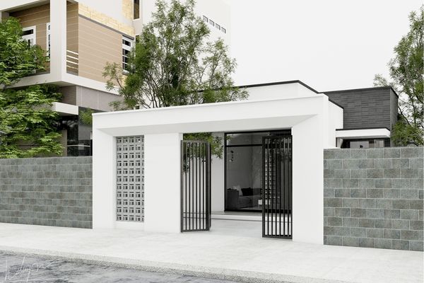 Gạch ốp chân tường giả đá đơn giản với màu xám ghi làm tôn lên màu trắng của cổng