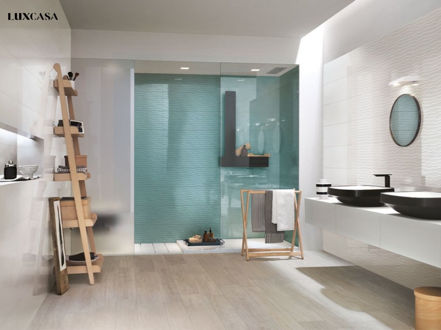 Sự kết hợp giữa gạch ốp tường đơn sắc và đồ gỗ tự nhiên màu nhạt mang đến phong cách thiết kế đơn giản