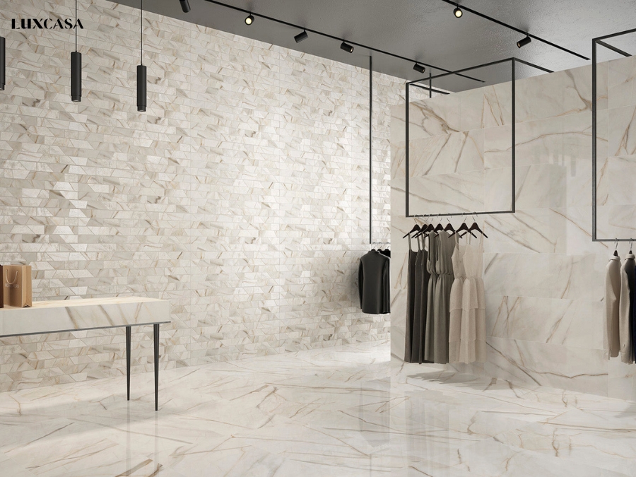 Gạch 30x60 màu trắng vân vàng là sự lựa chọn hoàn hảo để tạo ra không gian sang trọng và lịch sự cho cửa hàng, shop thời trang.