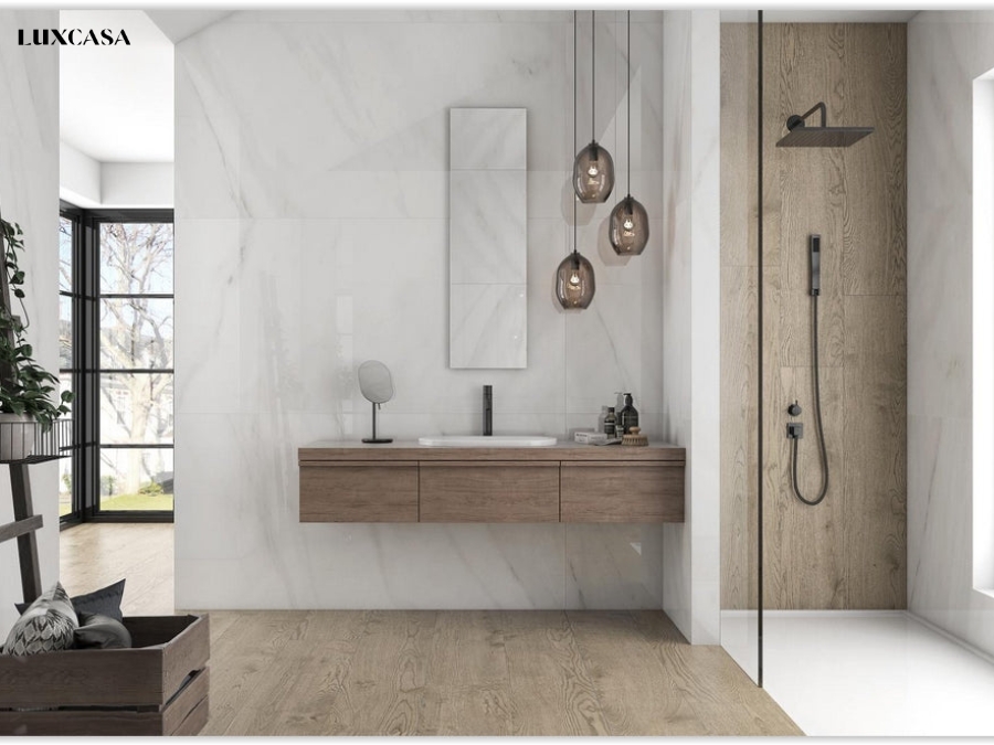 Việc kết hợp gạch 30x60 màu trắng vân đá và gạch nền giả gỗ giúp tạo ra một không gian ấm cúng, đầy sự ấn tượng.