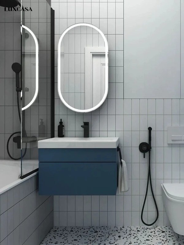 Mẫu gạch thẻ trắng trơn giản dị phối với gạch nền terrazzo sáng màu đem lại một nhà tắm nhẹ nhàng, đơn giản