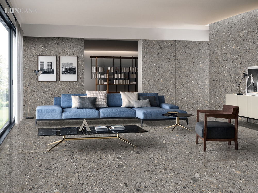 Phối màu cùng tông gạch ốp phòng khách để tạo ra một không gian hài hòa và trọn vẹn