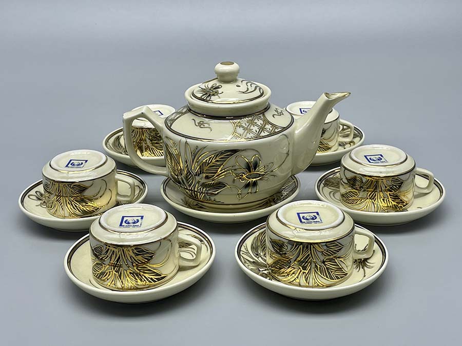 bo-am-tra-chuon-chuon-vai-vuong-gom-chu-dau-ve-vang-kim-2