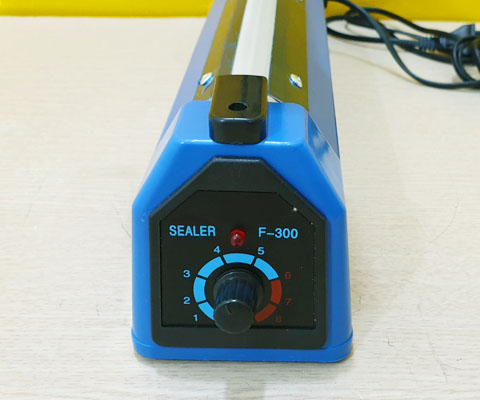 Máy hàn miệng túi dập tay PFS-300 vỏ nhựa
