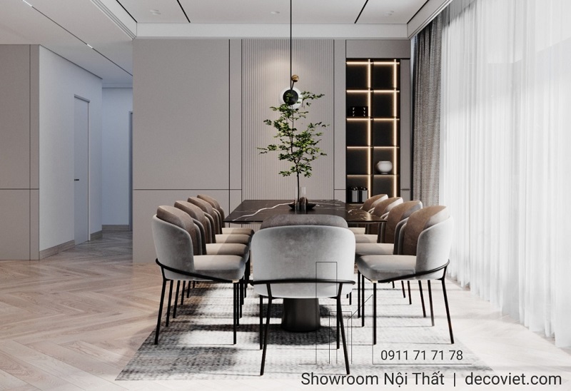 Thiết kế phòng ăn hiện đại với bàn ăn dài 10 ghế, bố trí ánh sáng tự nhiên tinh tế – thực hiện bởi nội thất Thủ Đức.