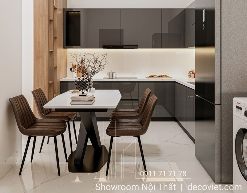 Bếp chữ L hiện đại kết hợp bàn ăn mặt đá gọn gàng – nội thất Thủ Đức thi công theo diện tích thực tế.