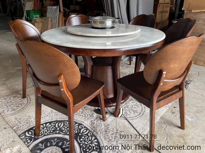 Bộ bàn ăn tròn nhập khẩu có bếp điện phù hợp phòng ăn hiện đại