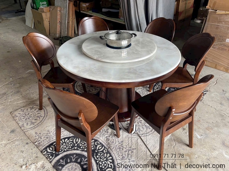 Bàn ăn tròn mặt đá nhập khẩu tích hợp bếp điện tiện lợi