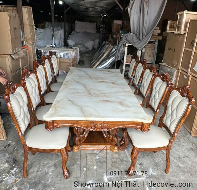 Bàn ăn gỗ mun mặt đá cao cấp chạm khắc tinh xảo, phối ghế da bò thật