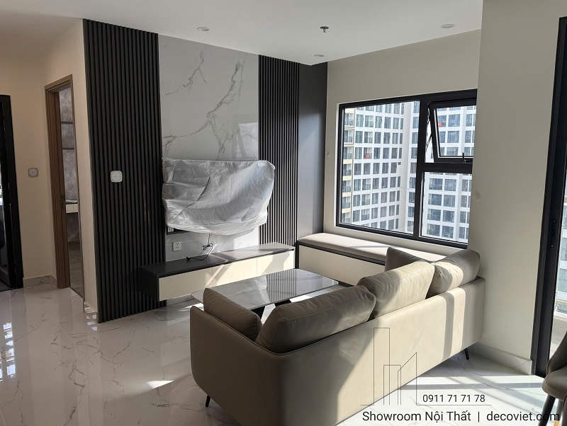 Thi công phòng khách căn hộ 2 phòng ngủ Vinhomes Grand Park tone màu be sáng thoáng đãng