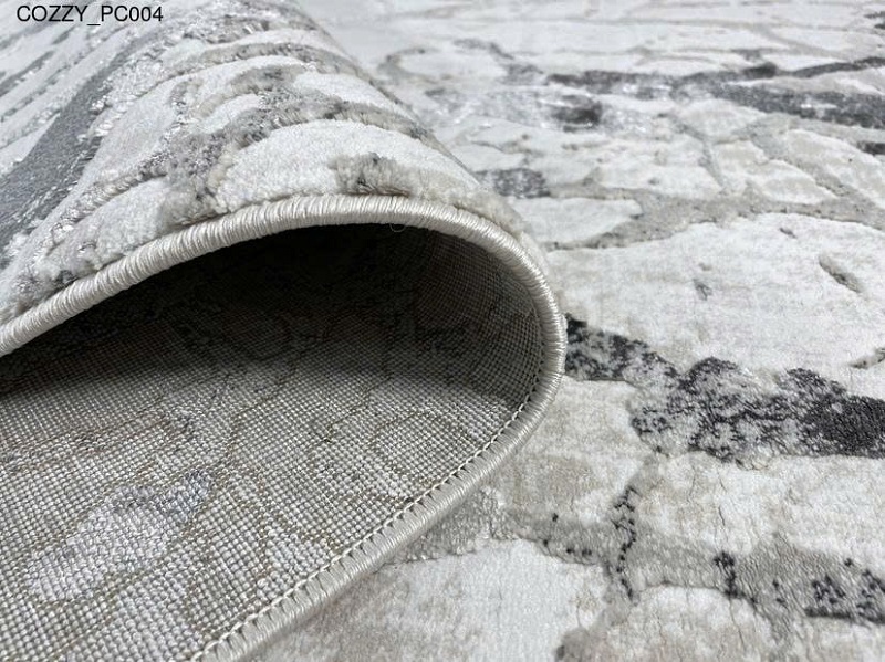 Cận cảnh đường dệt tinh xảo của thảm trải sàn, chất liệu mềm mại, an toàn cho da.