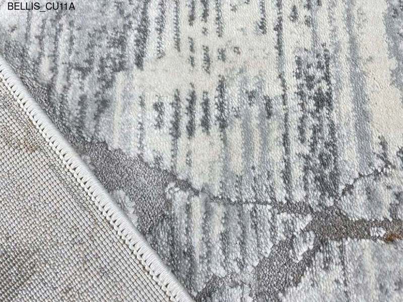 Thảm sofa tông ghi sáng phối hợp hài hòa cùng nội thất hiện đại, tạo điểm nhấn cho phòng khách.