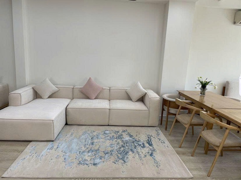 Thảm trải sàn phòng khách phong cách hiện đại với họa tiết gợn sóng nổi bật.