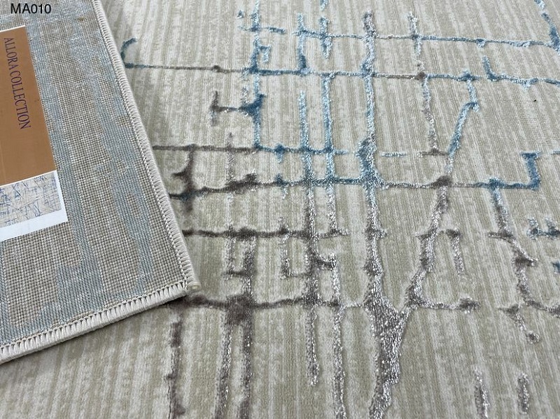 Mặt sau thảm trang trí phòng khách được gia công tỉ mỉ, giúp bám sàn tốt và hạn chế xê dịch.