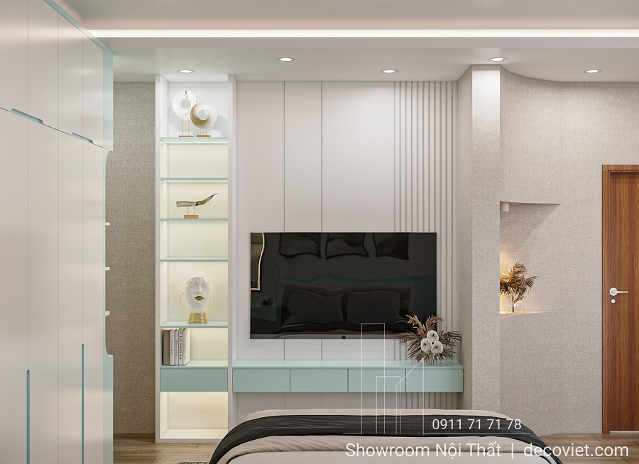 thiết kế phòng ngủ nhà phố hiện đại có tivi treo tường và kệ trang trí