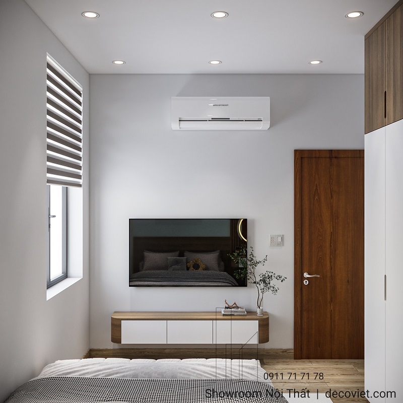 Thiết kế phòng ngủ hiện đại, tối ưu diện tích với kệ tivi treo tường gọn gàng.