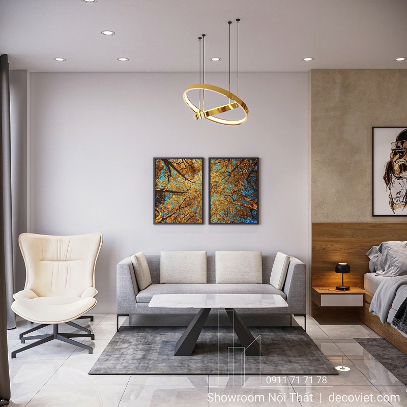 Phòng khách căn hộ cho thuê với sofa và kệ tivi sang trọng, gọn gàng