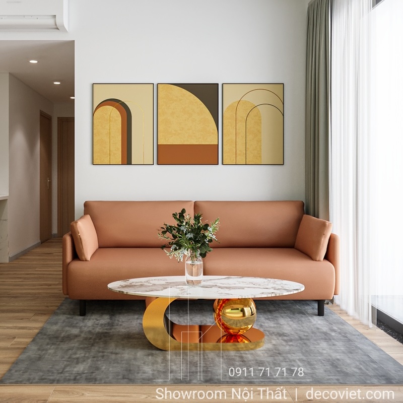 Sofa cam đất và bàn trà mặt đá sang trọng trong phòng khách chung cư 2PN