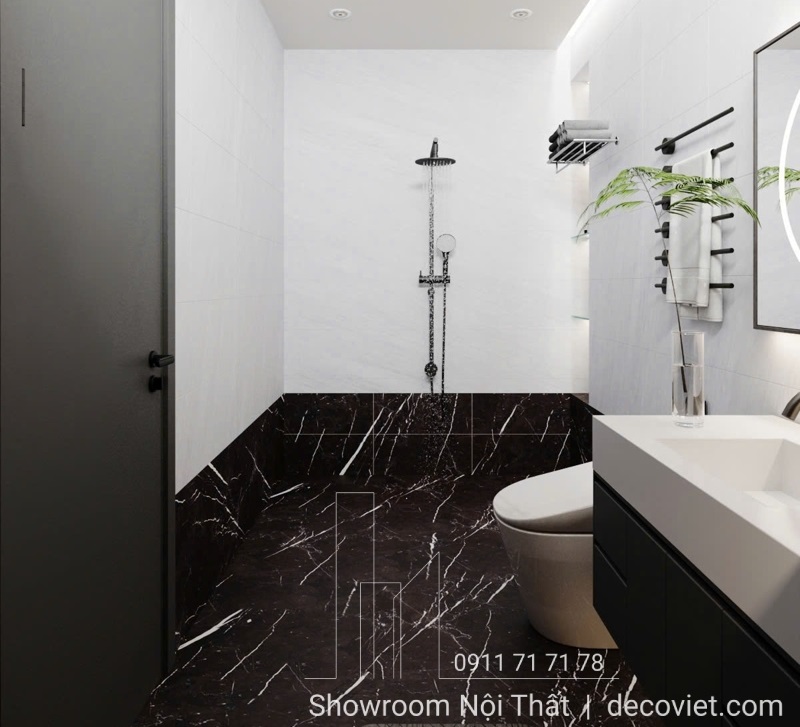 Phòng tắm hiện đại với gạch ốp đen vân mây và vòi sen cao cấp.