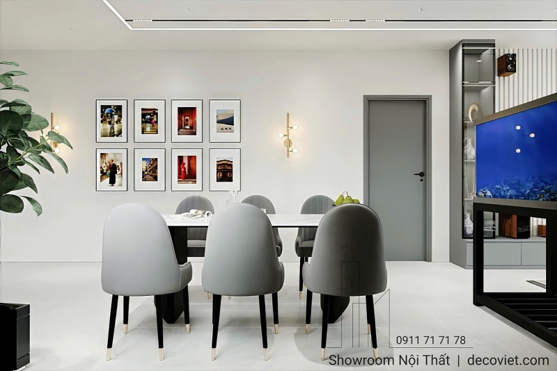 Không gian ăn uống ấm cúng, trang trí bằng bộ tranh tường nghệ thuật.