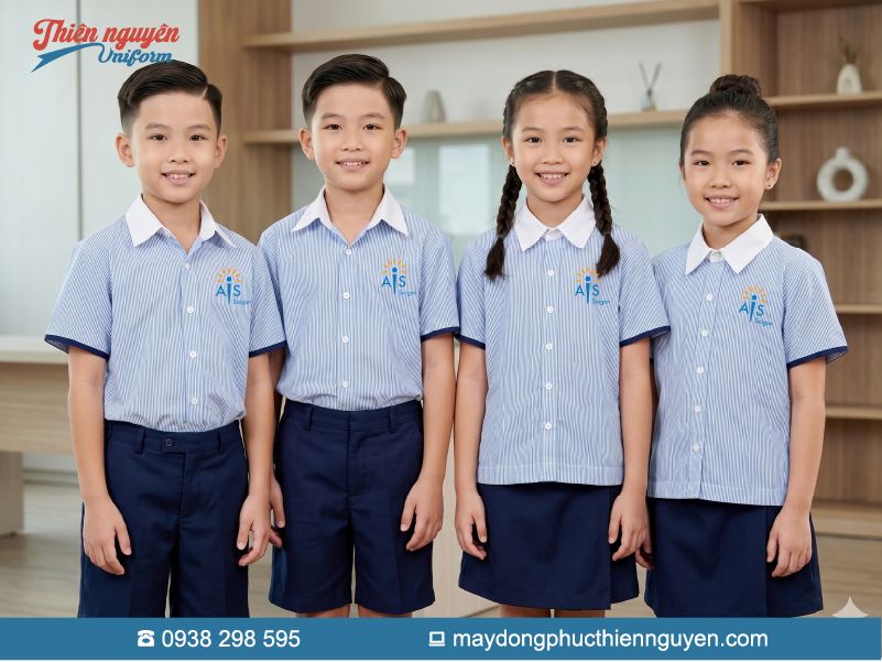 Đồng phục cho học sinh tiểu học Trường quốc tế Úc AIS Saigon gam màu trắng, xanh đậm tươi trẻ