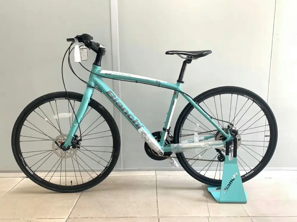 xe-dap-bianchi-camaleonte-sport