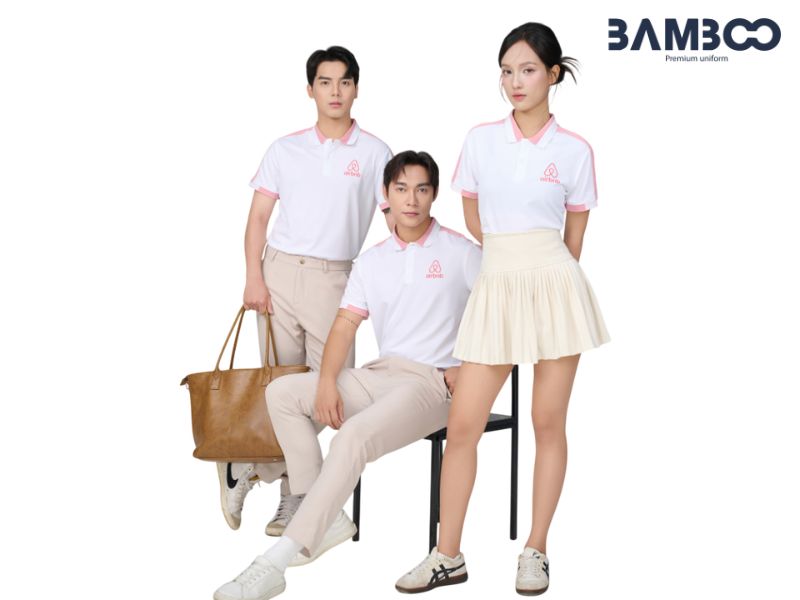 Áo đồng phục hồng có thể phối với jeans đen, jeans xanh, quần âu, kaki hoặc chân váy để tạo phong cách chuyên nghiệp và hiện đại