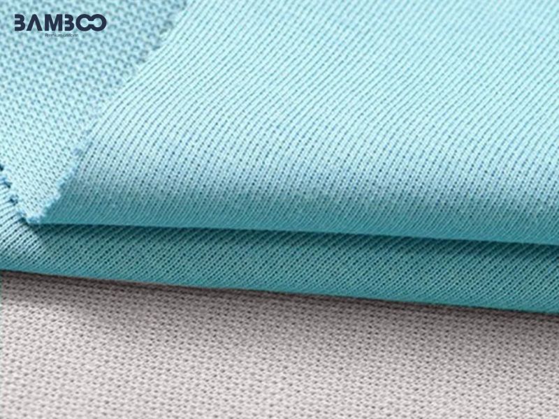 Chọn vải thoáng mát, co giãn, bền màu, độ dày vừa giúp đồng phục mùa hè thoải mái