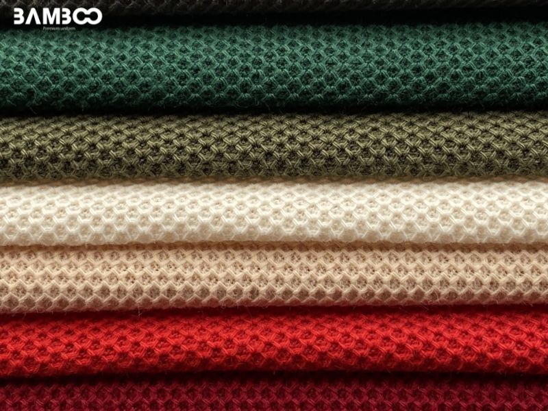 May đồng phục mùa hè nên chọn loại vải trọng lượng nhẹ, độ co giãn vừa phải