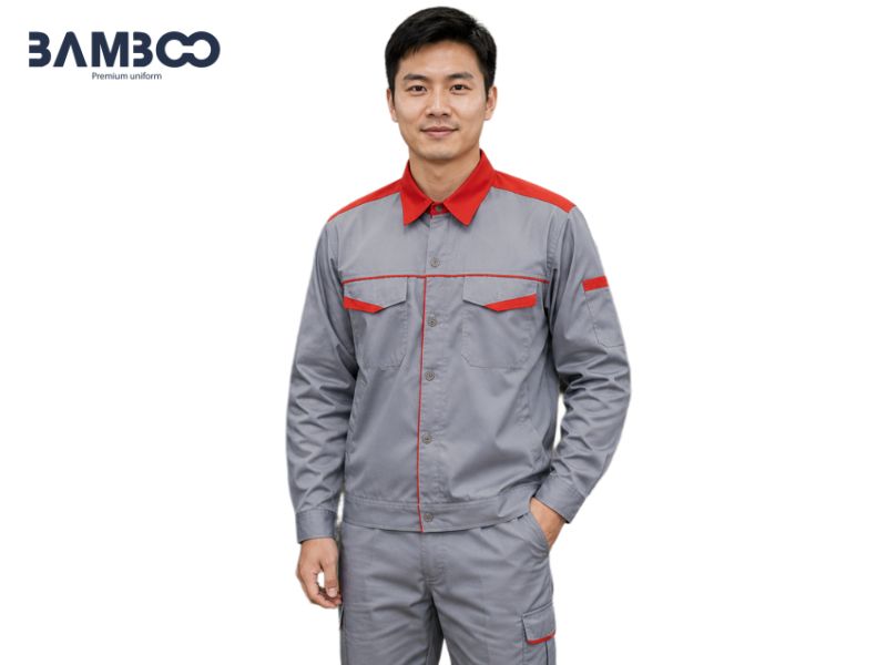 May áo bảo hộ xám cổ đỏ cần vải bền màu, đường may chắc và phối chi tiết chuẩn