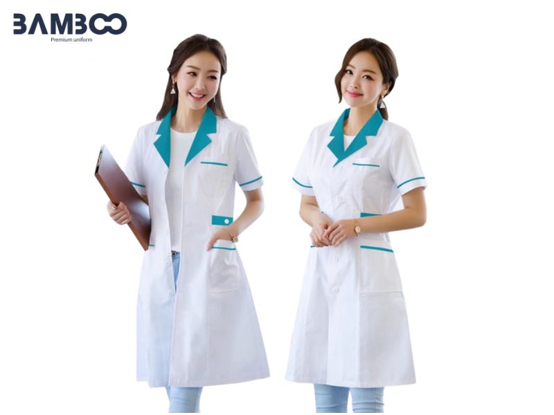 Đồng phục điều dưỡng trắng cổ xiên xanh cần vải dày vừa, ít nhăn, may tinh tế