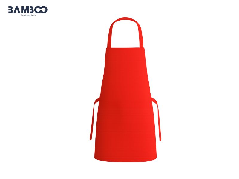 Tạp dề yếm đỏ giúp ngăn chặn dầu mỡ, nước sốt, bụi bẩn bám vào áo bên trong