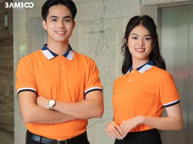Đồng phục màu cam mang ý nghĩa thu hút tài lộc và sự thịnh vượng giúp công việc kinh doanh ngày càng phát triển
