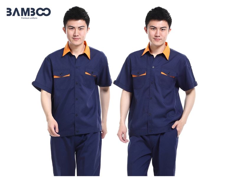 Áo bảo hộ xanh đen bền bỉ, an toàn giúp công nhân làm việc tự tin